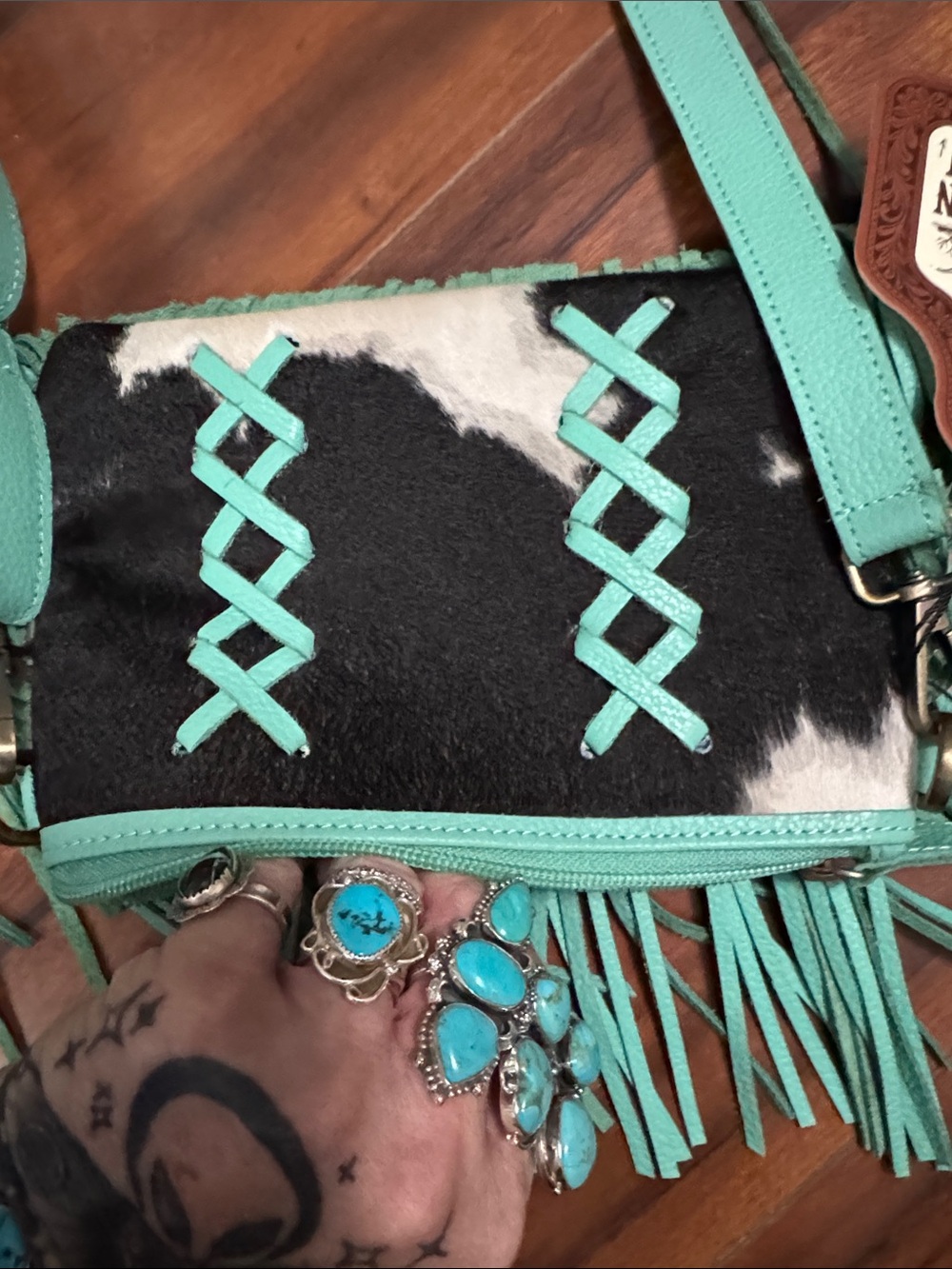 Turquoise Fringe Crossbody with Cowhide Accent by - Picture 4 of 5